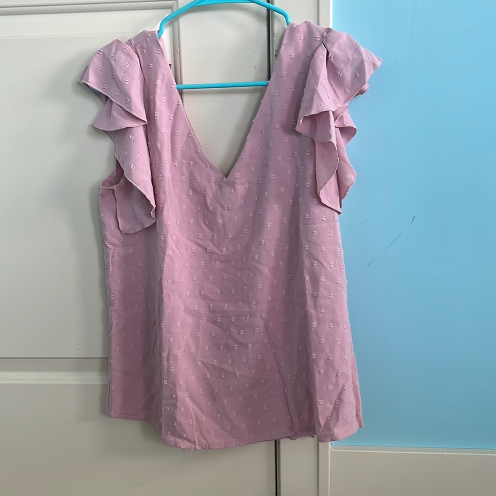 Pink blouse with ruffle sleeves